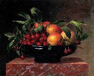Peaches and cherries in a bowl on a marble ledge