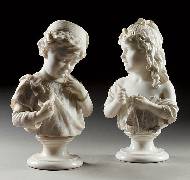 Two busts of a young boy and a girl
